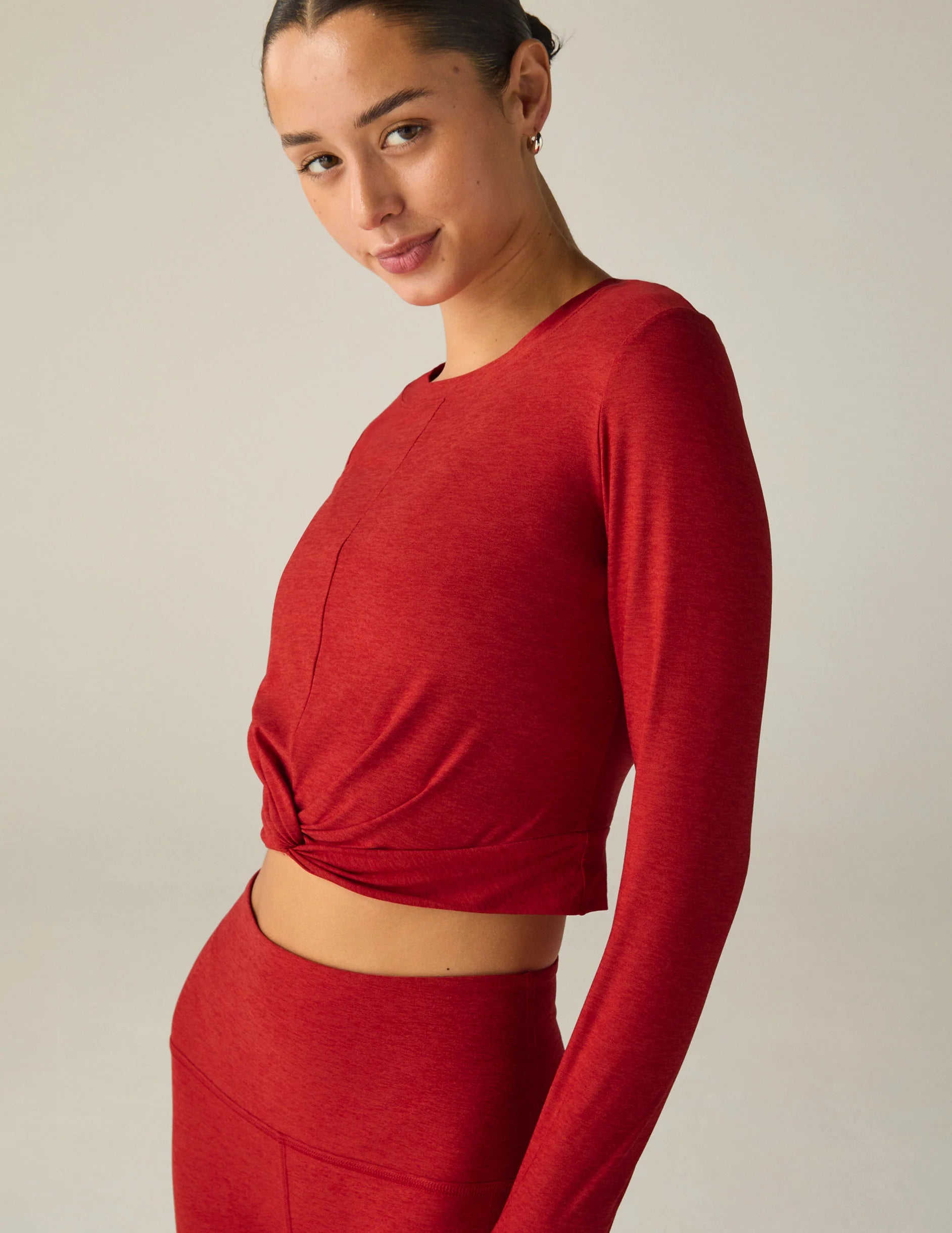 Beyond Yoga Featherweight Center Stage Cropped Long Sleeve Pullover in Ruby Red