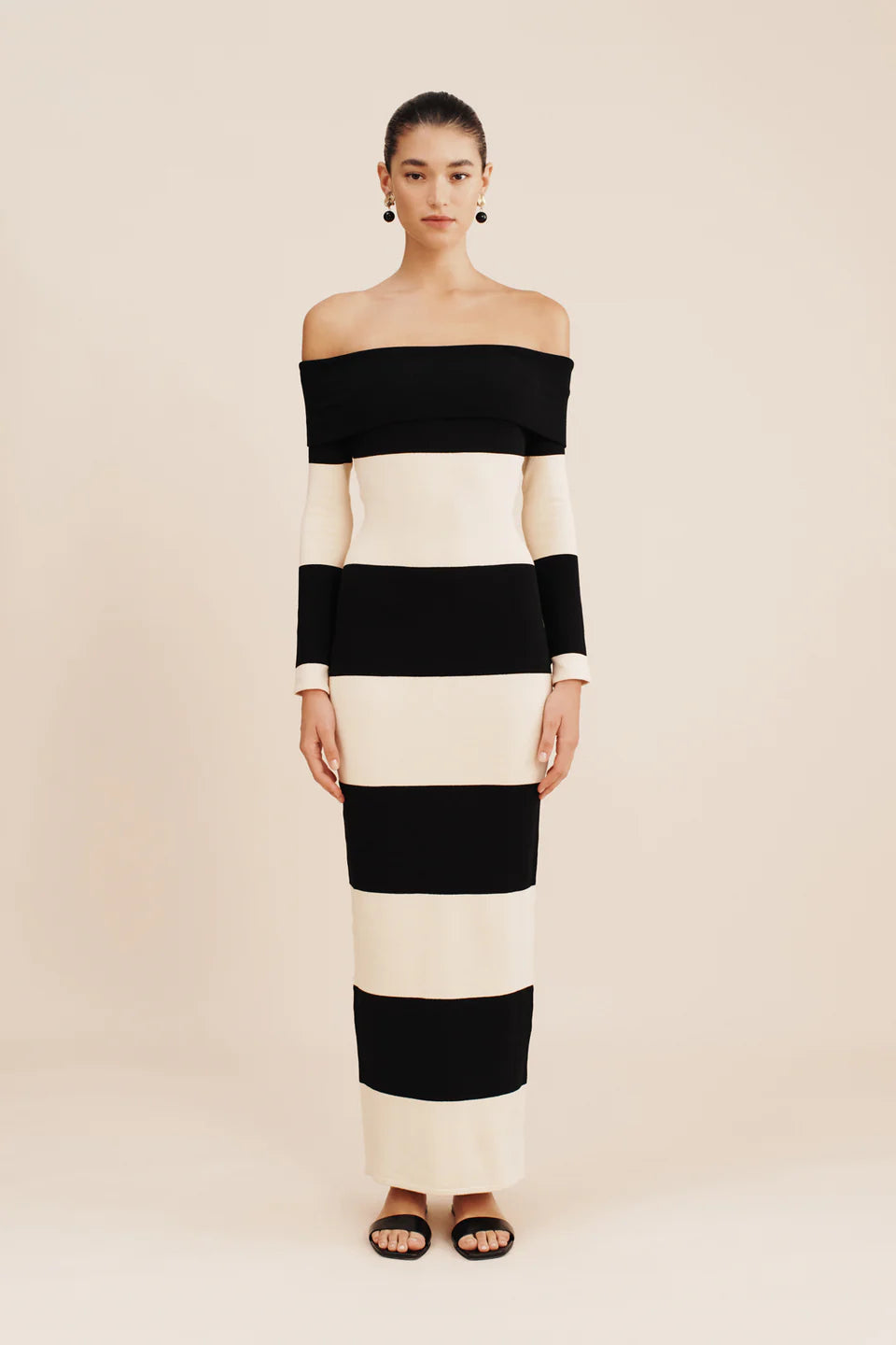 posse cream and black theo over the shoulder dress - silhouette striped black and white long sleeve dress - off the shoulder full length long sleeve striped dress - fitted elegant body con dress -  